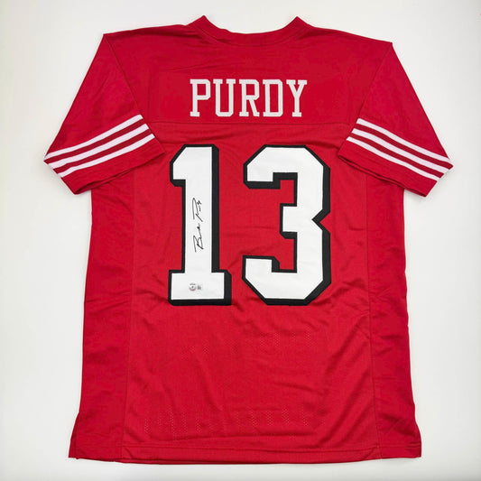 Autographed/Signed Brock Purdy San Francisco Red Alternate Football Jersey Beckett BAS COA
