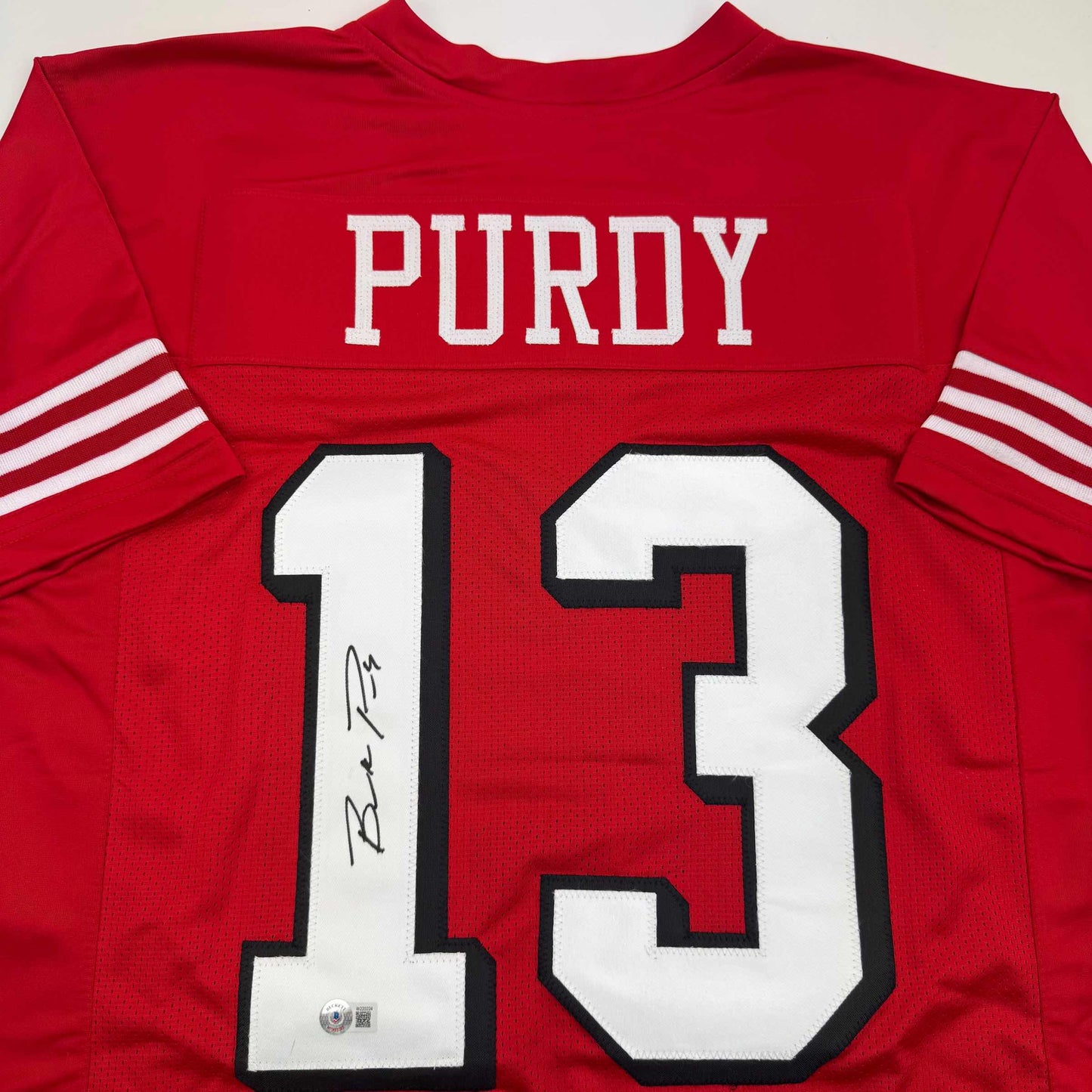 Autographed/Signed Brock Purdy San Francisco Red Alternate Football Jersey Beckett BAS COA