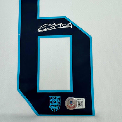 Framed Autographed/Signed Harry Maguire 35x39 England White Soccer Jersey Beckett BAS COA