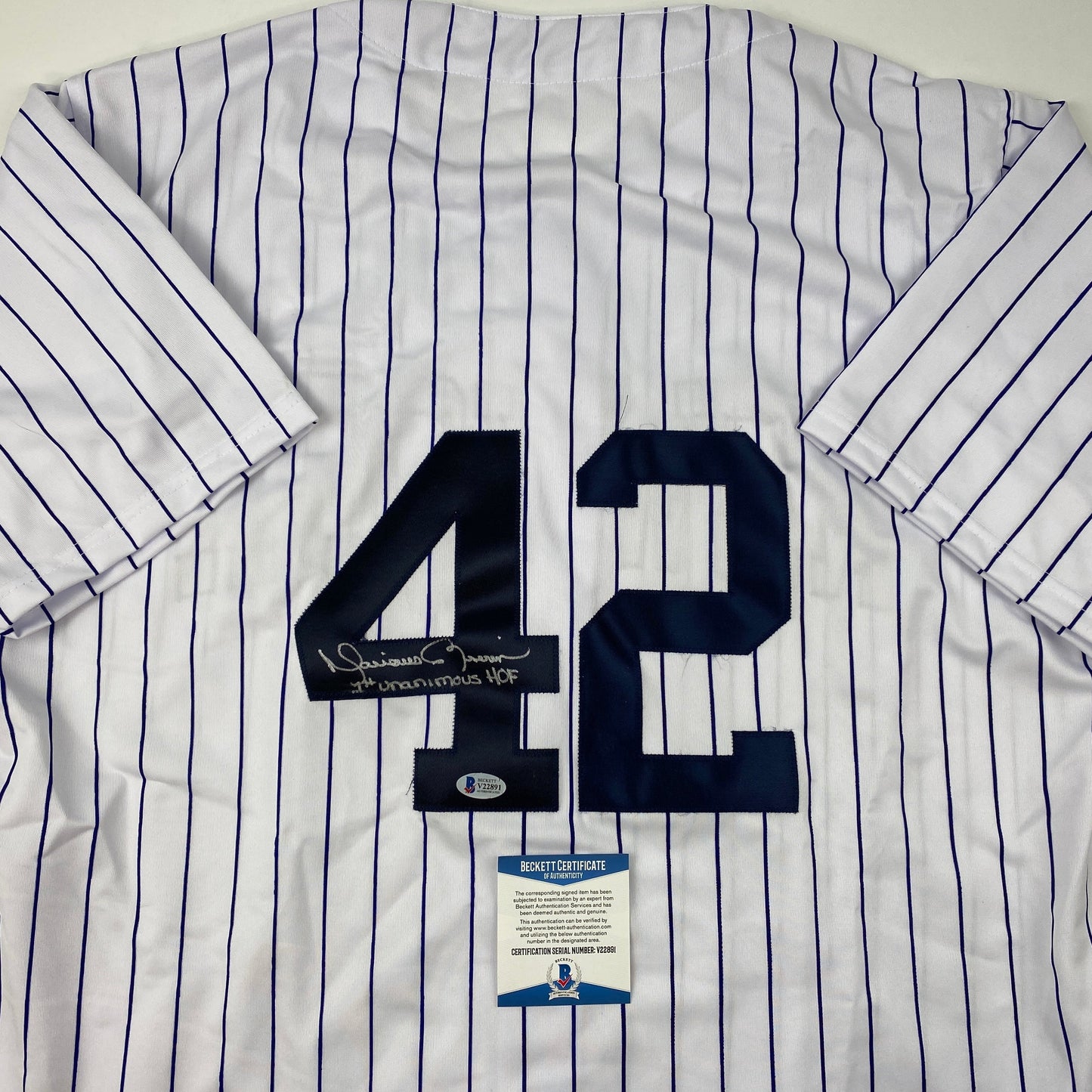 Autographed/Signed Mariano Rivera 1st Unanimous HOF New York Pinstripe Baseball Jersey Beckett BAS COA