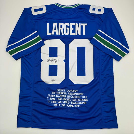 Autographed/Signed Steve Largent HOF 95 Seattle Blue Stat Football Jersey Beckett BAS COA