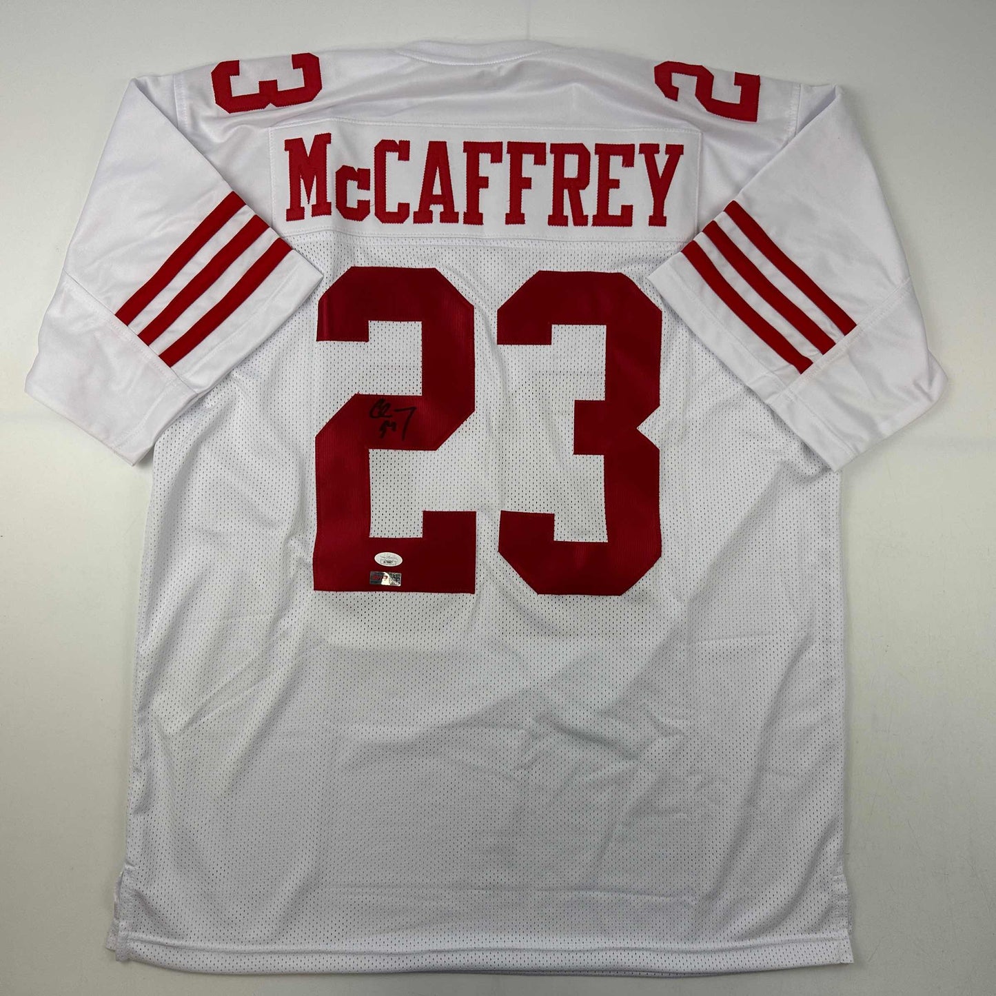 Autographed/Signed Christian McCaffrey San Francisco White Football Jersey JSA COA
