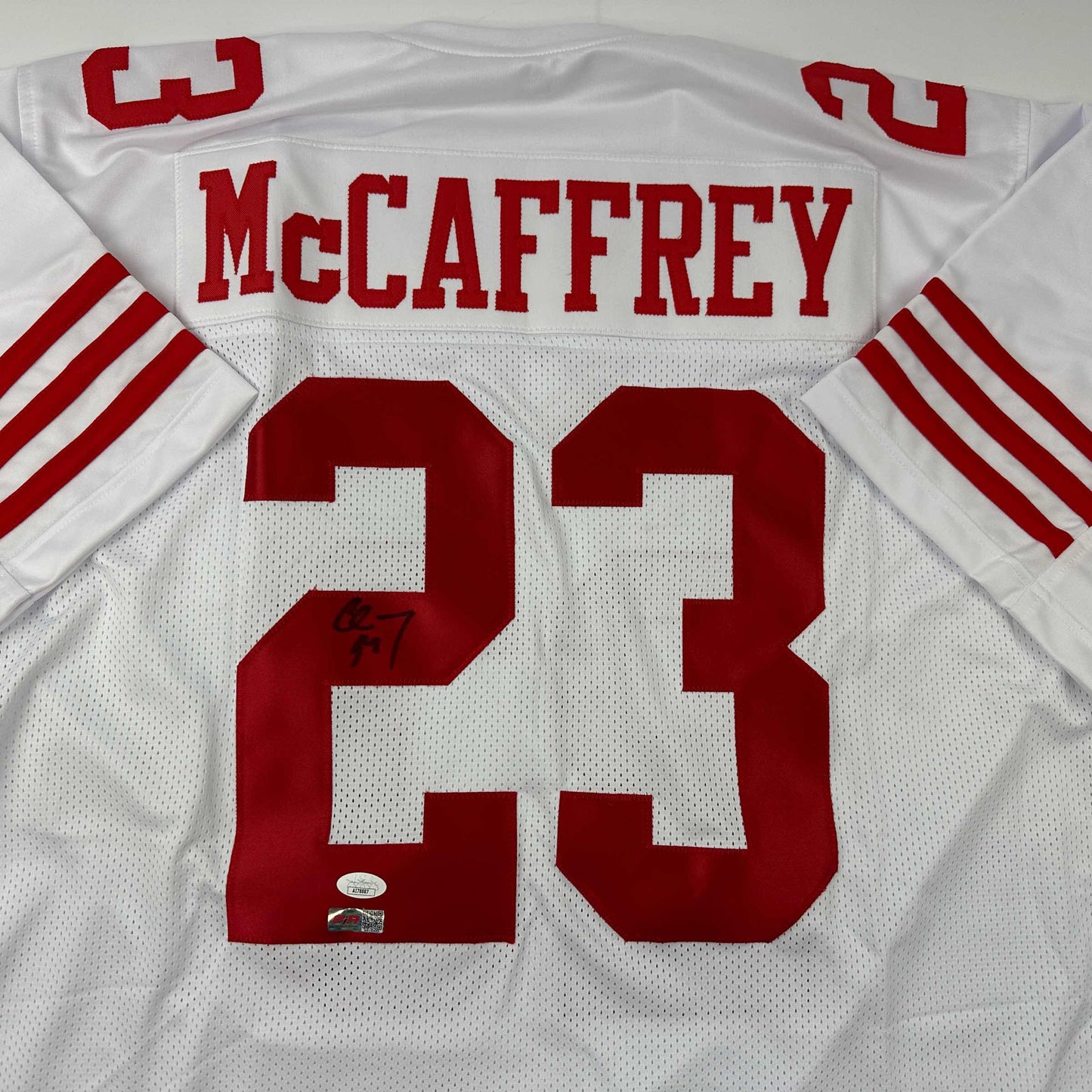 Autographed/Signed Christian McCaffrey San Francisco White Football Jersey JSA COA