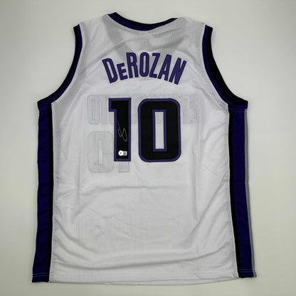 Autographed/Signed DeMar DeRozan Sacramento White Basketball Jersey Beckett BAS COA
