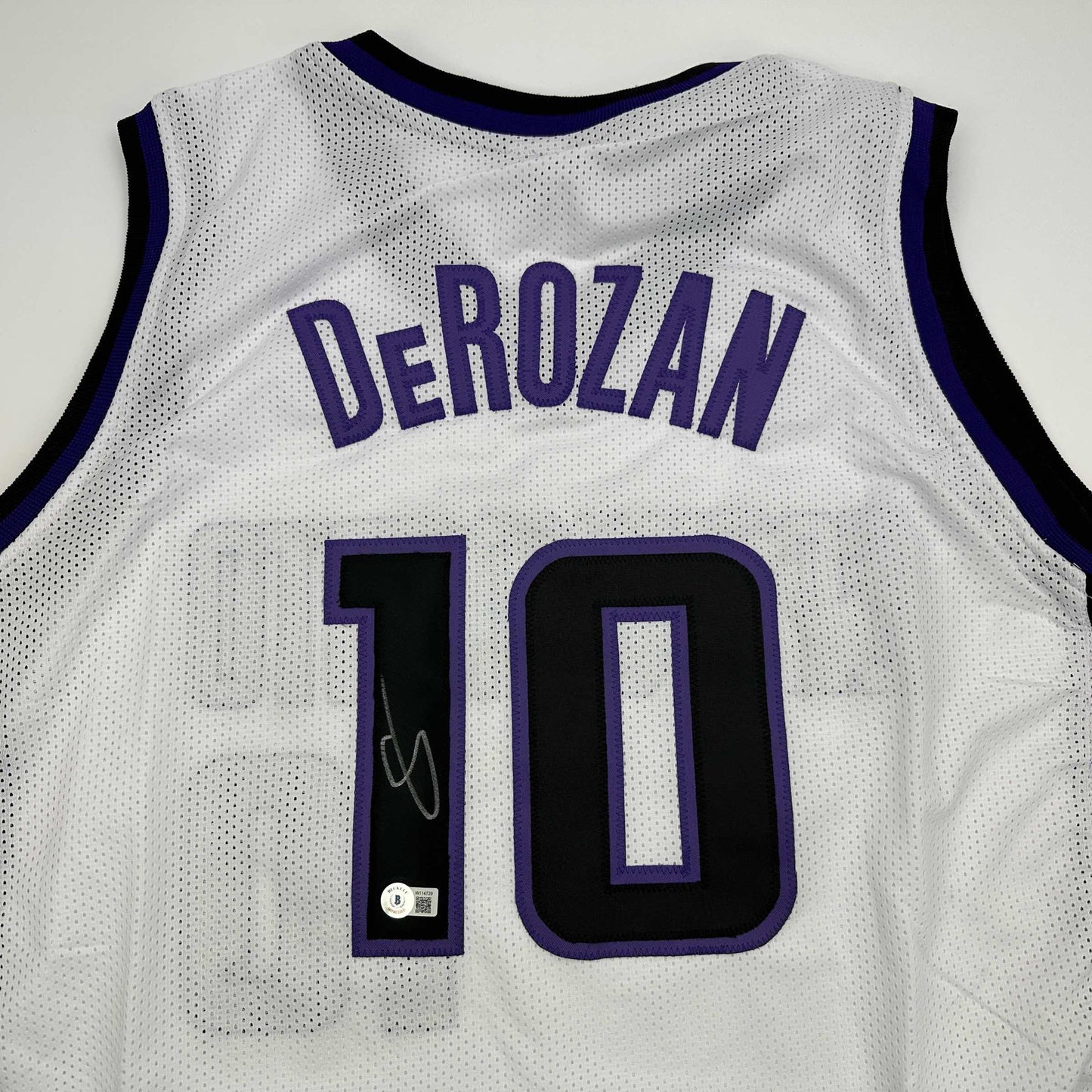 Autographed/Signed DeMar DeRozan Sacramento White Basketball Jersey Beckett BAS COA