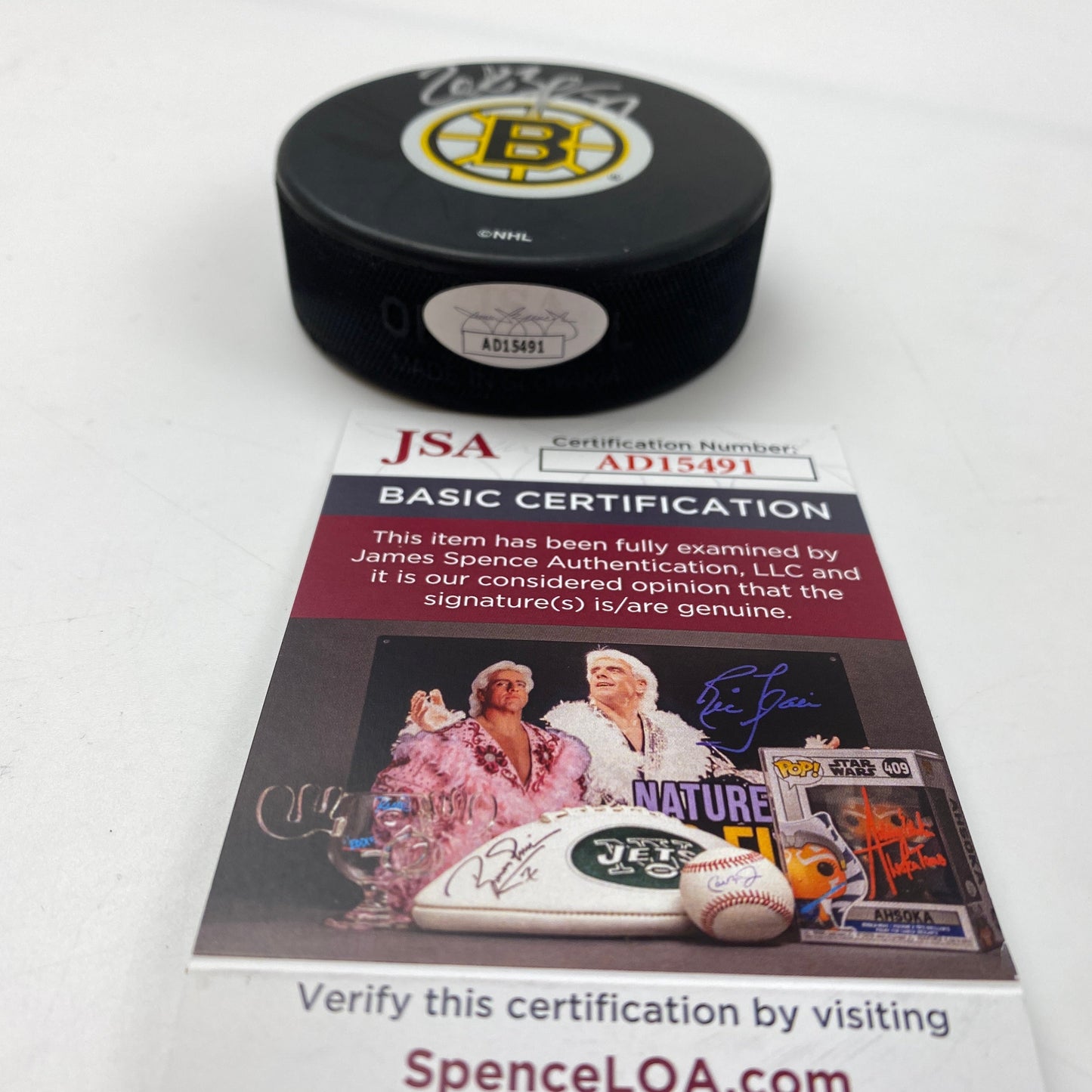 Autographed/Signed Patrice Bergeron Boston Bruins Logo Hockey Puck JSA COA