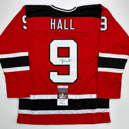 Autographed/Signed Taylor Hall New Jersey Red Hockey Jersey JSA COA