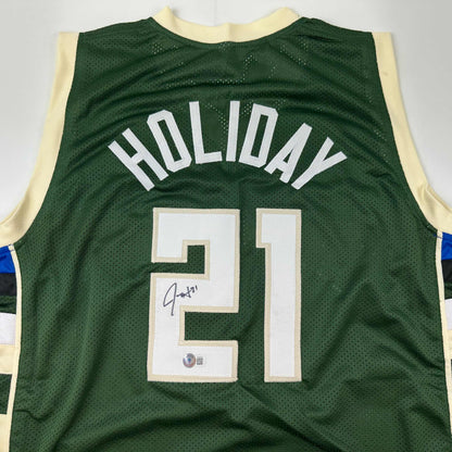 Autographed/Signed Jrue Holiday Milwaukee Green Basketball Jersey Beckett BAS COA