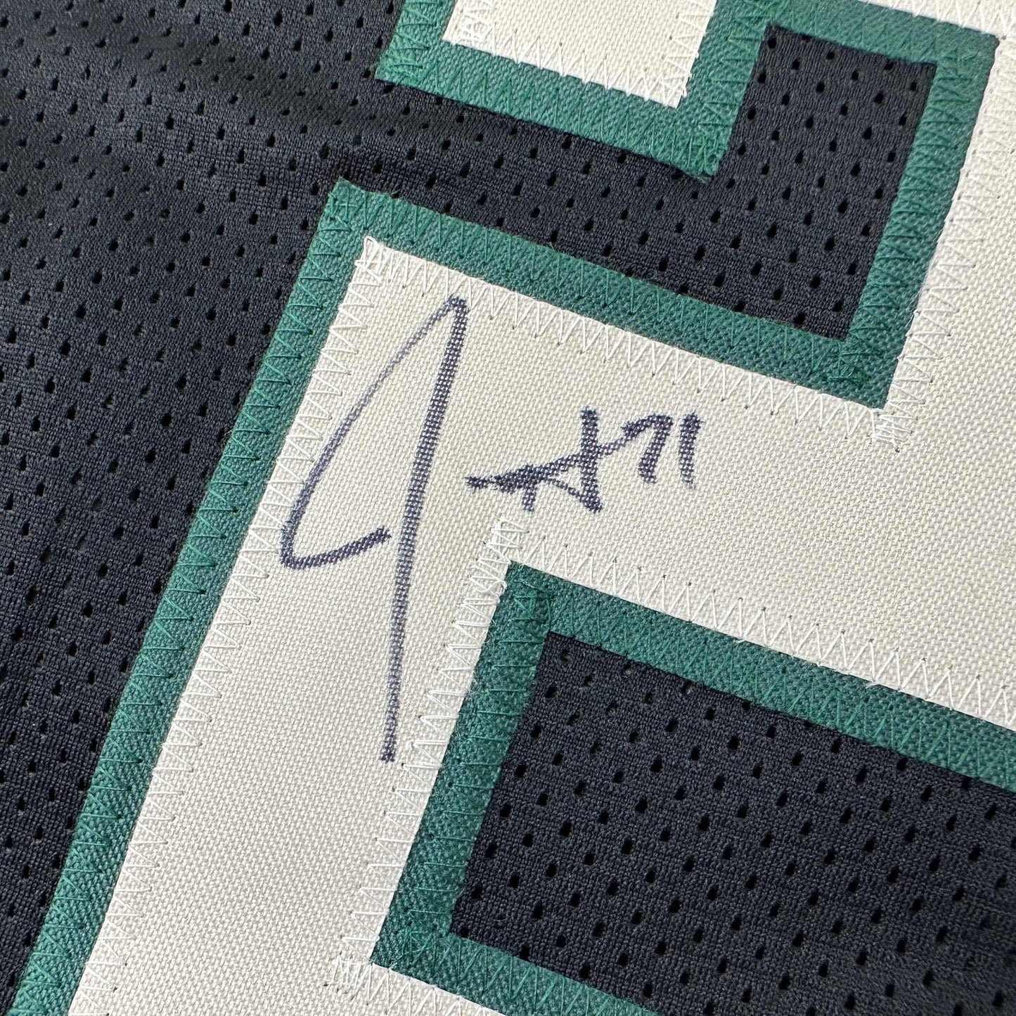 Autographed/Signed Jrue Holiday Milwaukee Black Basketball Jersey Beckett BAS COA