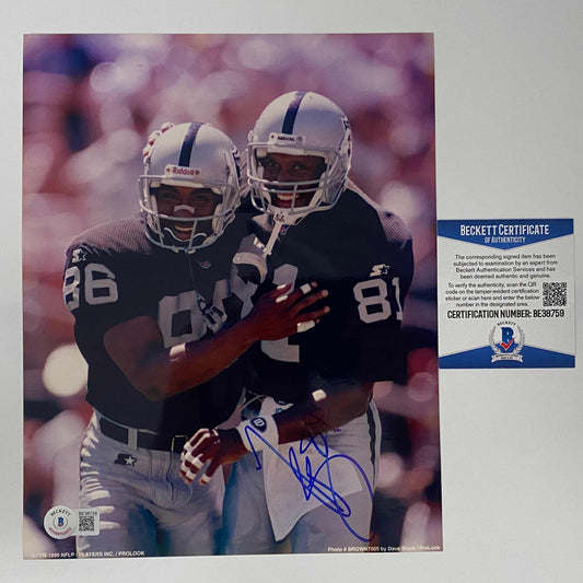 Autographed/Signed Tim Brown Las Vegas Oakland Raiders 8x10 Football Photo Beckett BAS COA #1