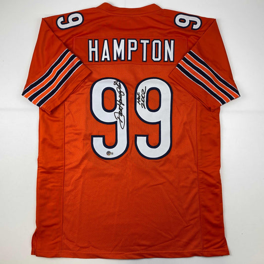 Autographed/Signed Dan Hampton HOF 2002 Chicago Orange Football Jersey Beckett BAS COA
