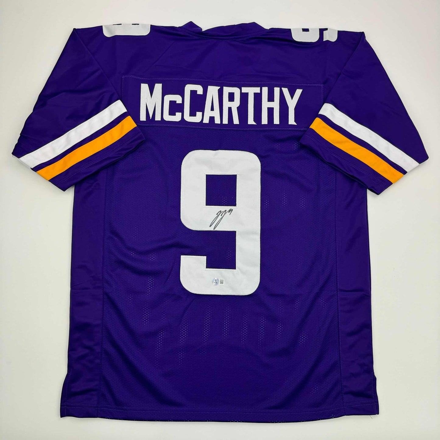 Autographed/Signed J.J. JJ McCarthy Minnesota Purple Football Jersey Beckett BAS COA