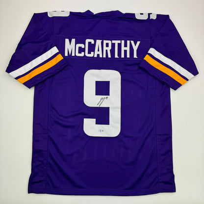 Autographed/Signed J.J. JJ McCarthy Minnesota Purple Football Jersey Beckett BAS COA