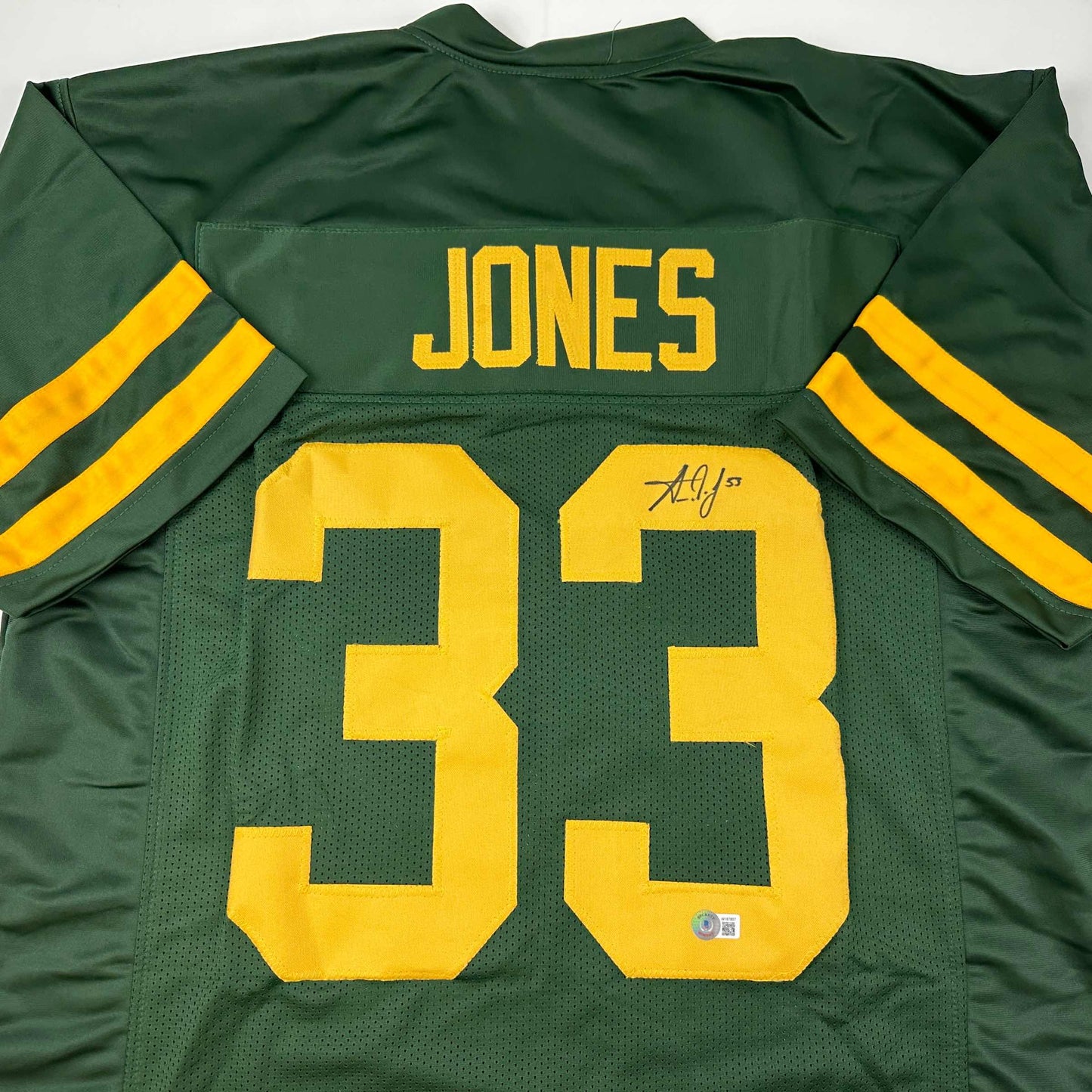 Autographed/Signed Aaron Jones Green Bay Color Rush Football Jersey Beckett BAS COA