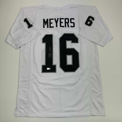 Autographed/Signed Jakobi Meyers Las Vegas Oakland White Football Jersey Beckett BAS COA