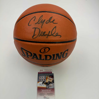 Autographed/Signed Clyde Drexler Full Size Spalding Basketball JSA COA
