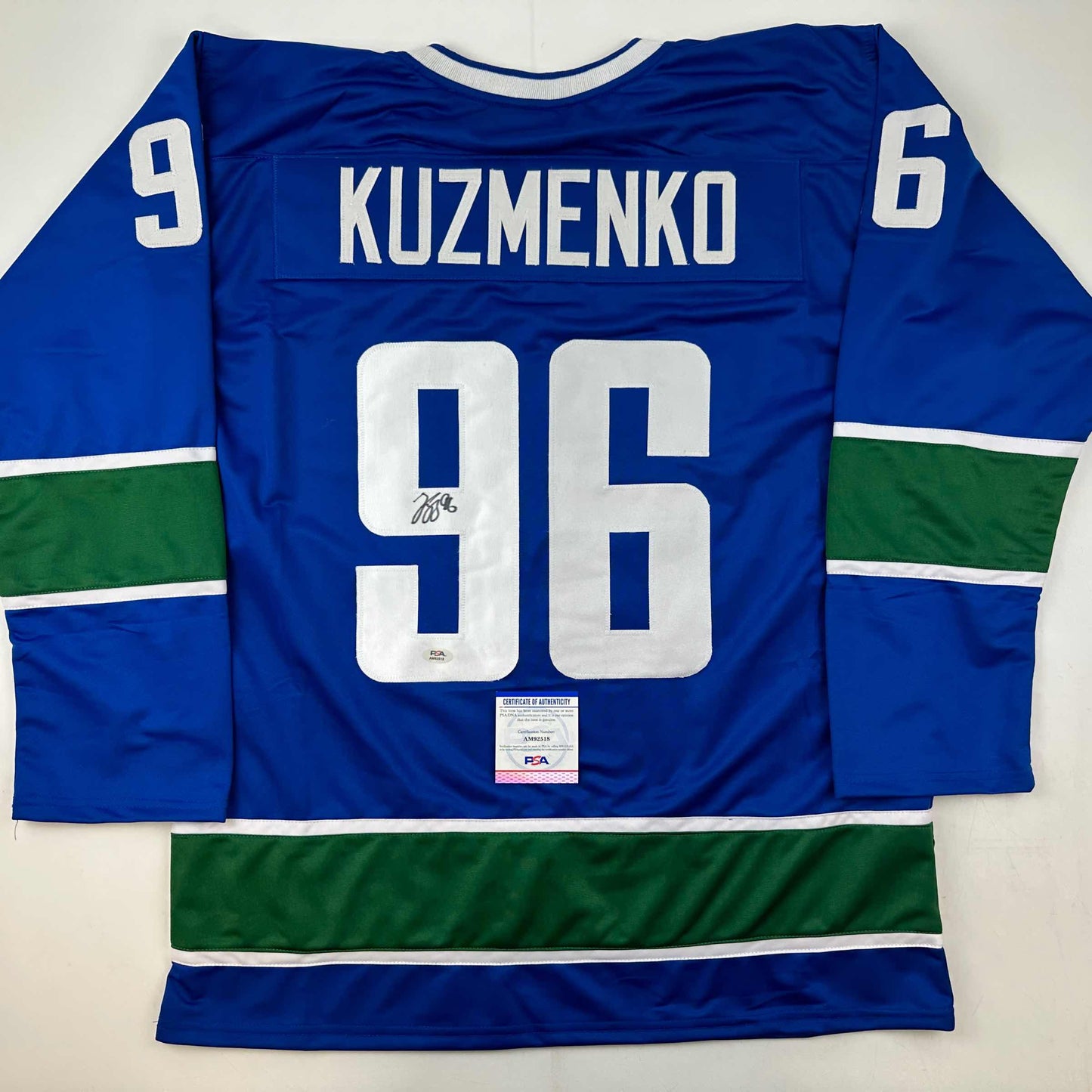 Autographed/Signed Andrei Kuzmenko Vancouver Blue Hockey Jersey PSA/DNA COA