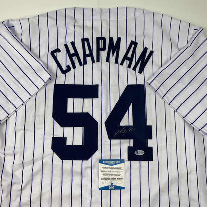 Autographed/Signed Aroldis Chapman New York Pinstripe Baseball Jersey Beckett BAS COA