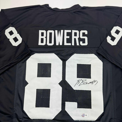 Autographed/Signed Brock Bowers Las Vegas Oakland Black Football Jersey Beckett BAS COA
