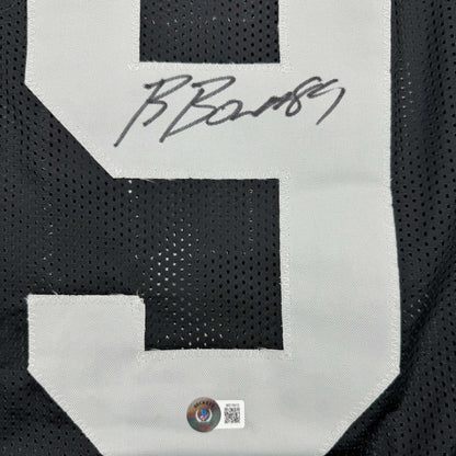 Autographed/Signed Brock Bowers Las Vegas Oakland Black Football Jersey Beckett BAS COA