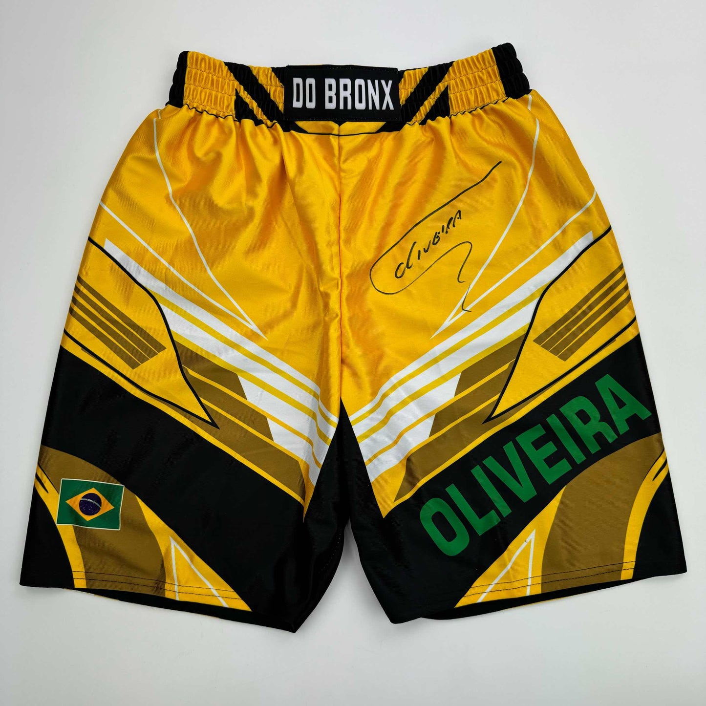 Autographed/Signed Charles Oliveira Yellow Brazil UFC MMA Trunks Shorts Ultimate Fighting Beckett BAS COA
