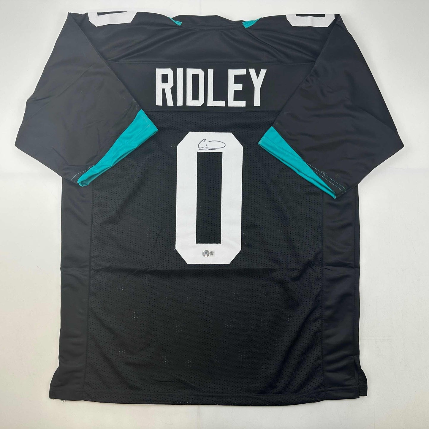Autographed/Signed Calvin Ridley Jacksonville Black Football Jersey Beckett BAS COA