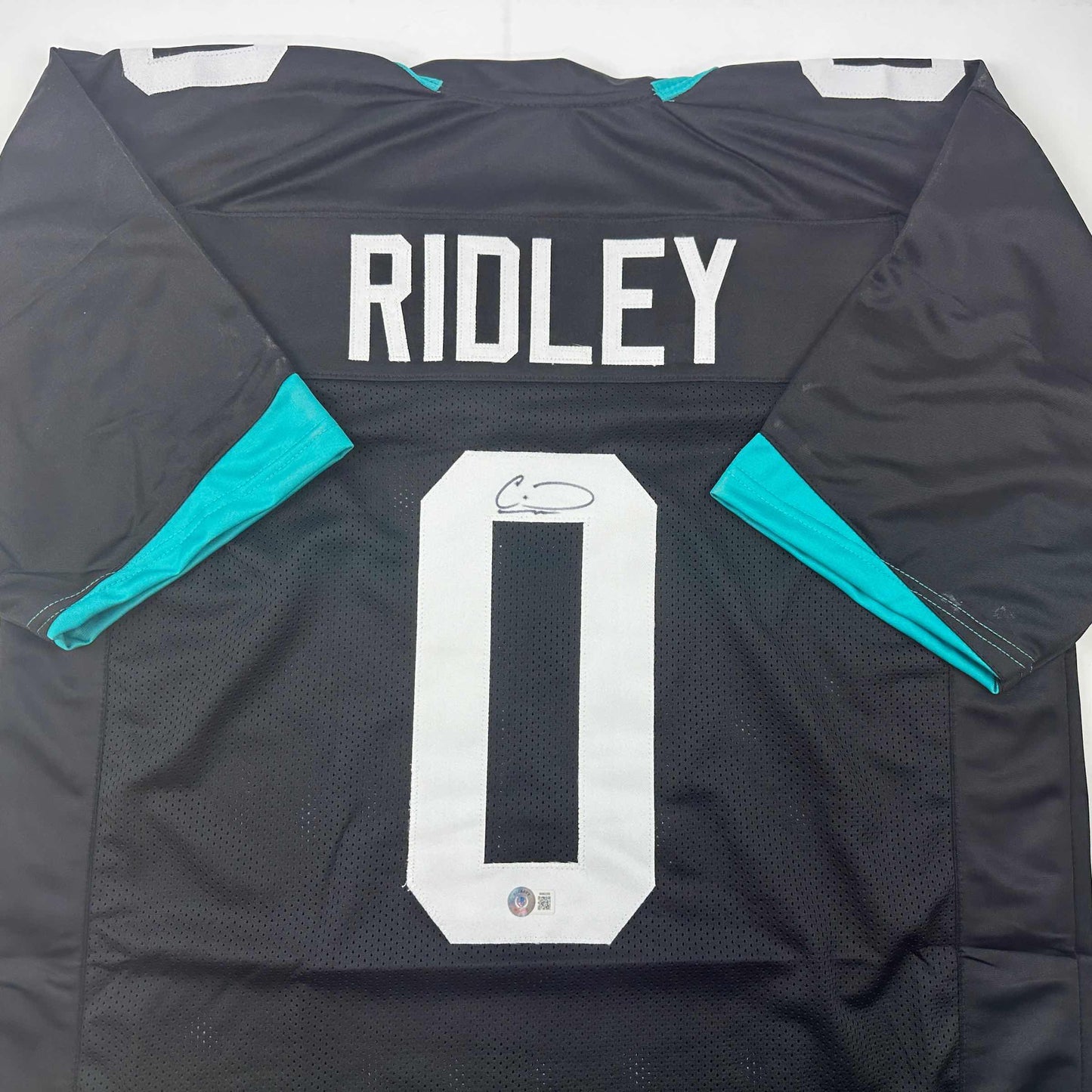 Autographed/Signed Calvin Ridley Jacksonville Black Football Jersey Beckett BAS COA