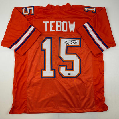 Autographed/Signed Tim Tebow Florida Orange College Football Jersey Beckett BAS COA