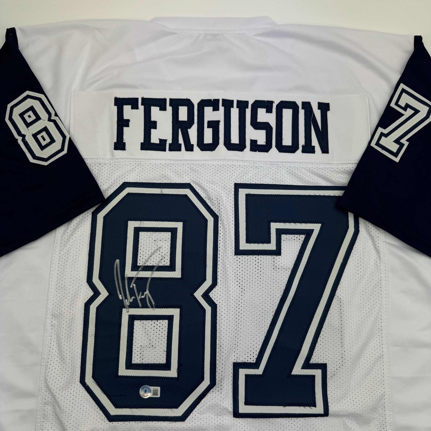 Autographed/Signed Jake Ferguson Dallas White Color Rush Football Jersey Beckett BAS COA