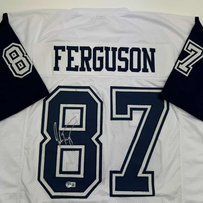 Autographed/Signed Jake Ferguson Dallas White Color Rush Football Jersey Beckett BAS COA