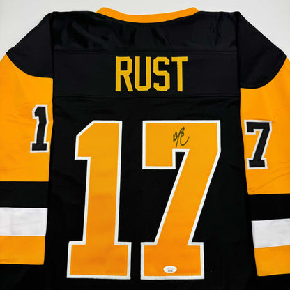 Autographed/Signed Bryan Rust Pittsburgh Black Hockey Jersey JSA COA