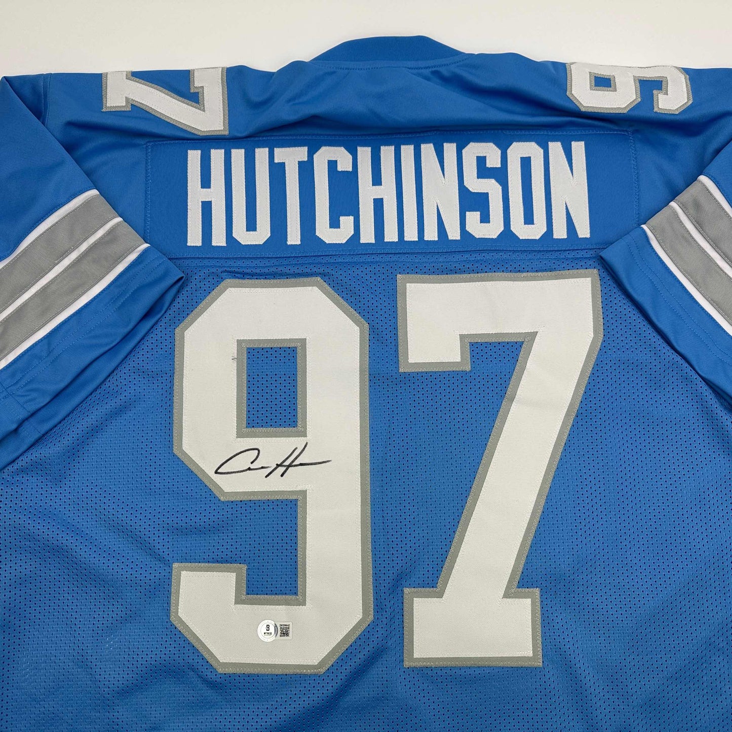 Autographed/Signed Aidan Hutchinson Detroit Blue Current Football Jersey Beckett BAS COA