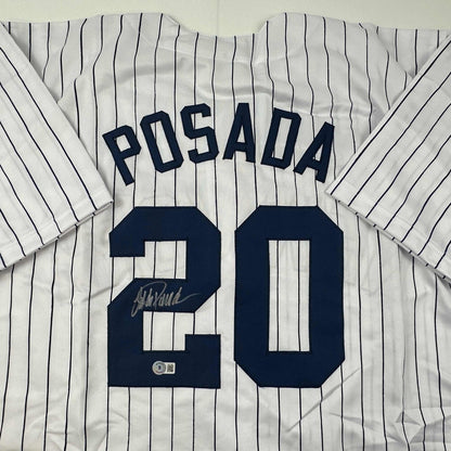 Autographed/Signed Jorge Posada New York Pinstripe Baseball Jersey Beckett BAS COA