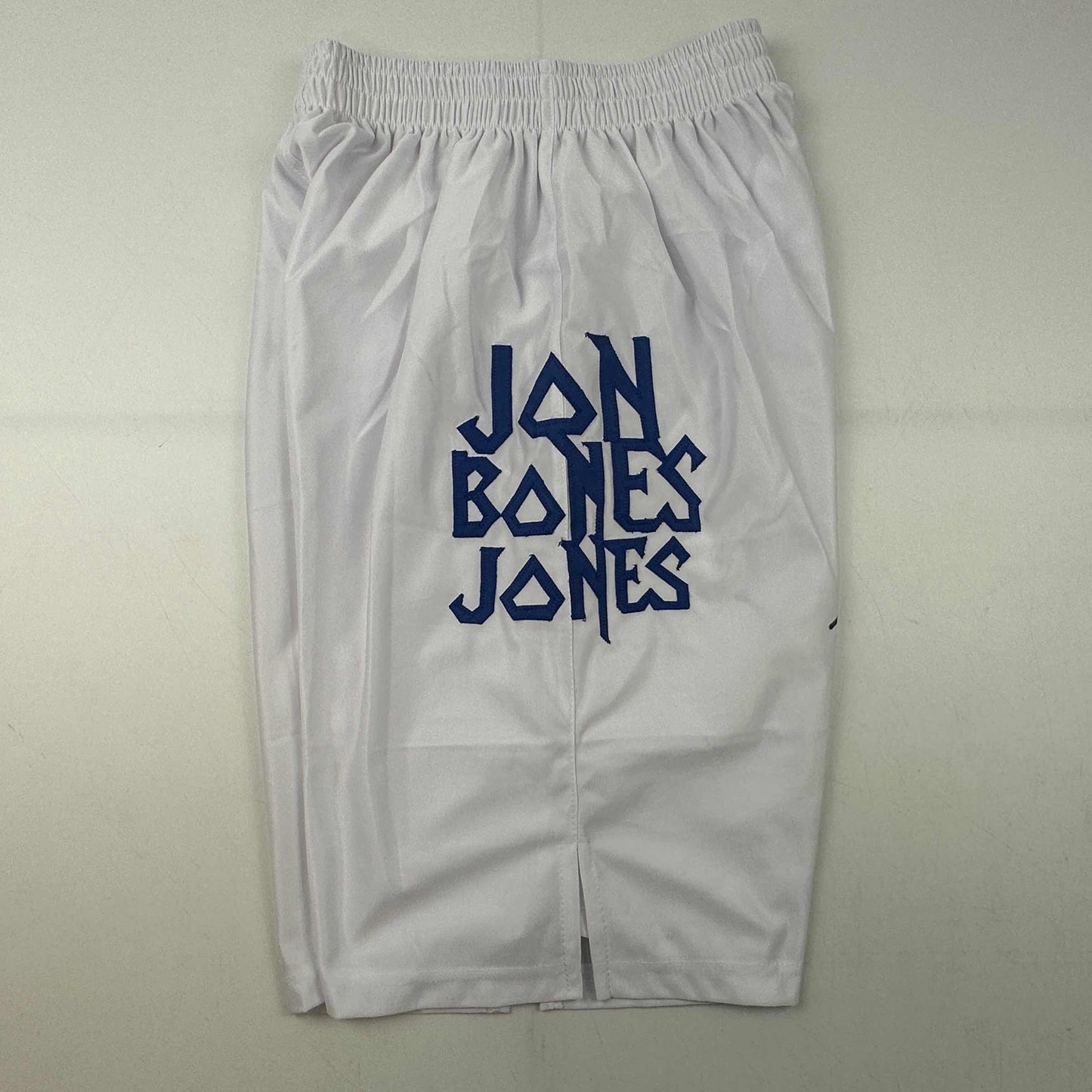 Autographed/Signed Jon Bones Jones Black UFC MMA White Trunks Ultimate Fighting Beckett BAS COA