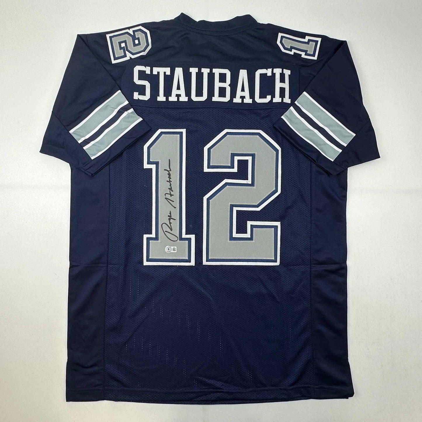 Autographed/Signed Roger Staubach Dallas Blue Football Jersey Beckett BAS COA