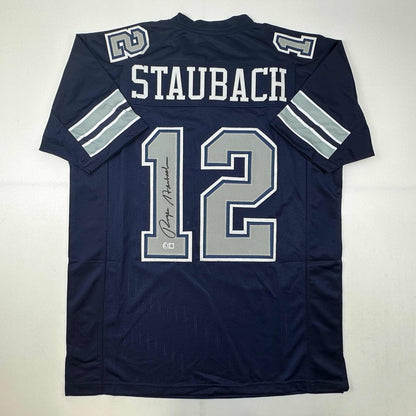 Autographed/Signed Roger Staubach Dallas Blue Football Jersey Beckett BAS COA