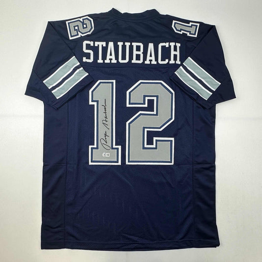 Autographed/Signed Roger Staubach Dallas Blue Football Jersey Beckett BAS COA