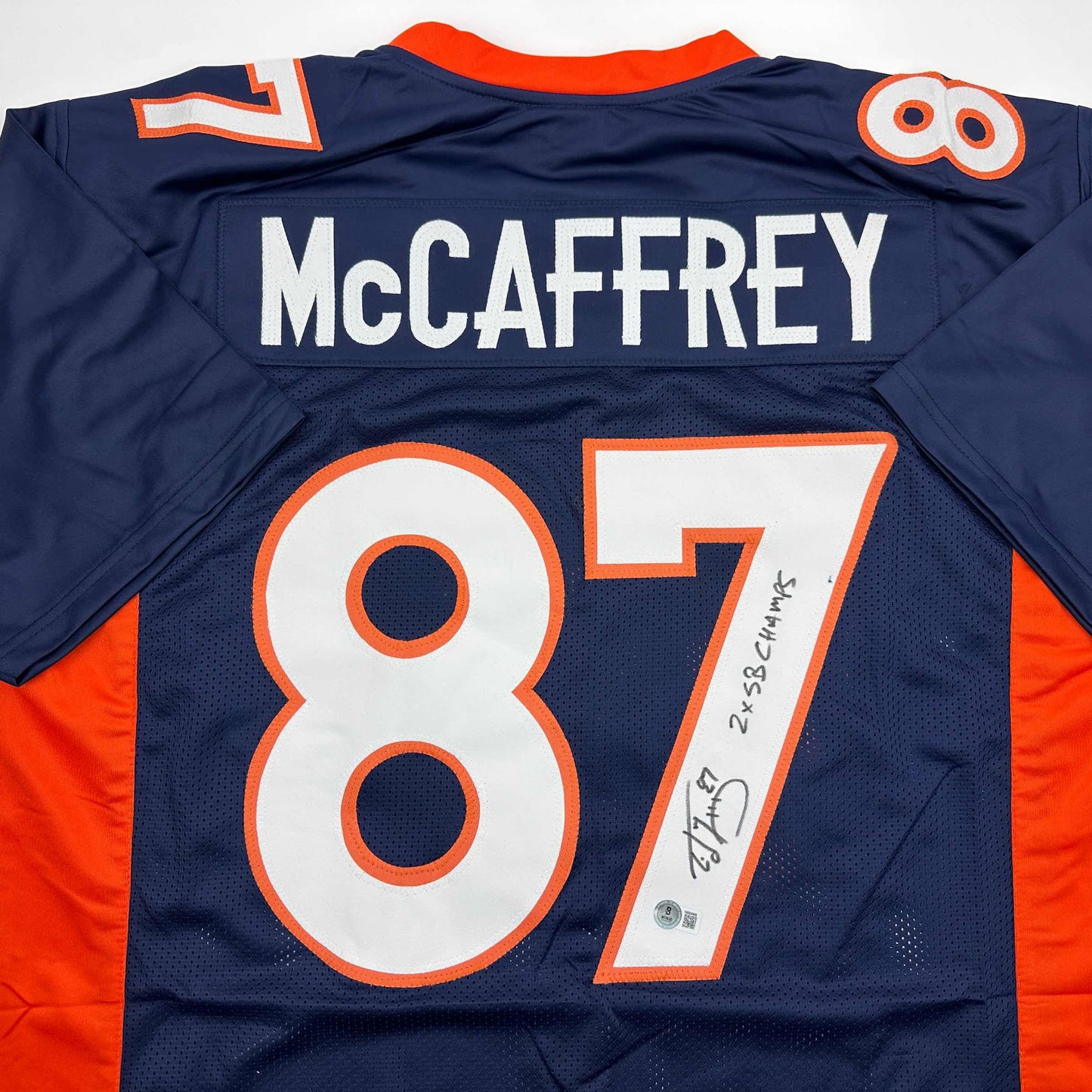 Autographed/Signed Ed McCaffrey 2x SB Champs Denver Blue Football Jersey Beckett BAS COA