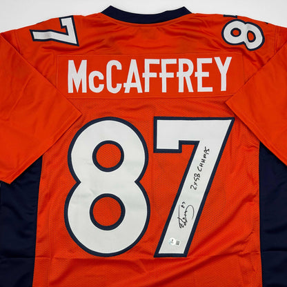 Autographed/Signed Ed McCaffrey 2x SB Champs Denver Orange Football Jersey Beckett BAS COA