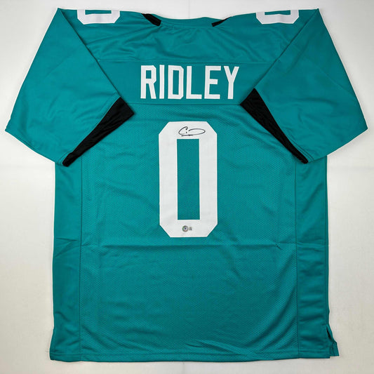 Autographed/Signed Calvin Ridley Jacksonville Teal Football Jersey Beckett BAS COA