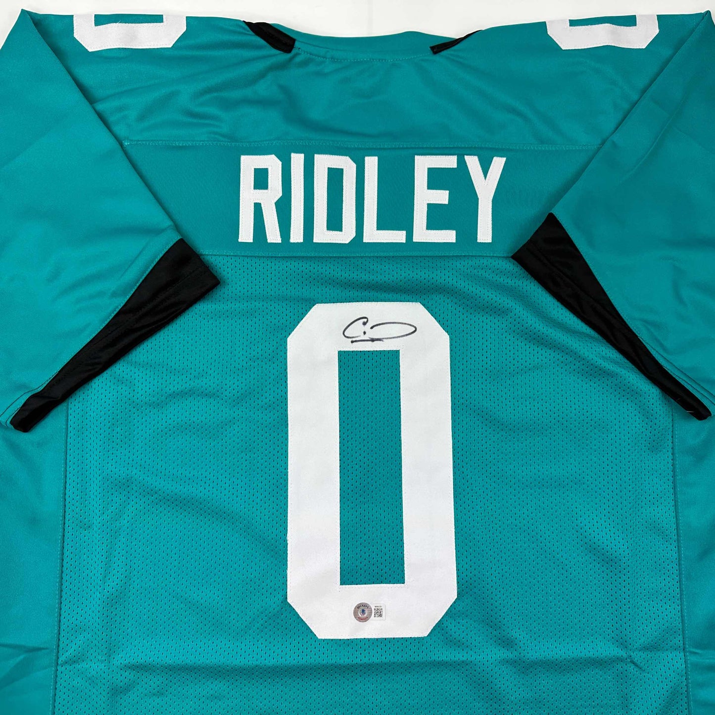 Autographed/Signed Calvin Ridley Jacksonville Teal Football Jersey Beckett BAS COA