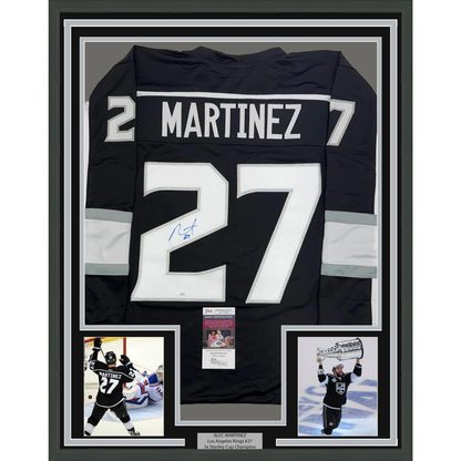 Framed Autographed/Signed Alec Martinez 35x39 Los Angeles LA Black Hockey Jersey JSA COA