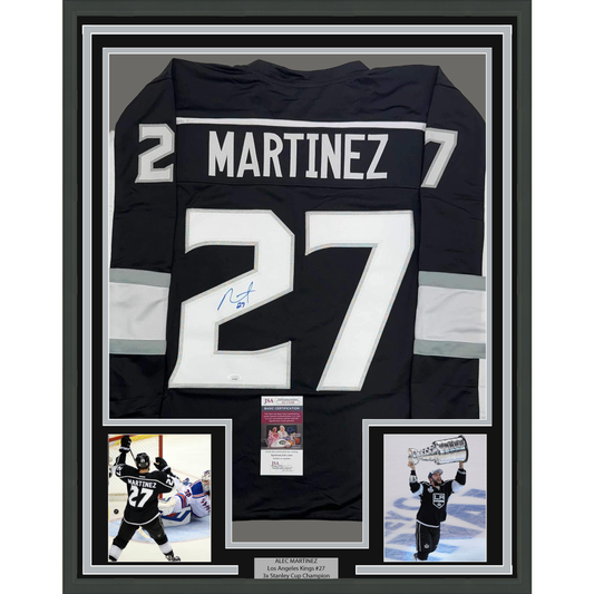 Framed Autographed/Signed Alec Martinez 35x39 Los Angeles LA Black Hockey Jersey JSA COA