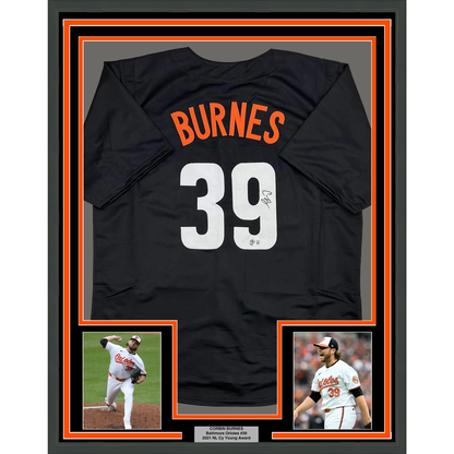 Framed Autographed/Signed Corbin Burnes 35x39 Baltimore Black City Connect Baseball Jersey Beckett BAS COA