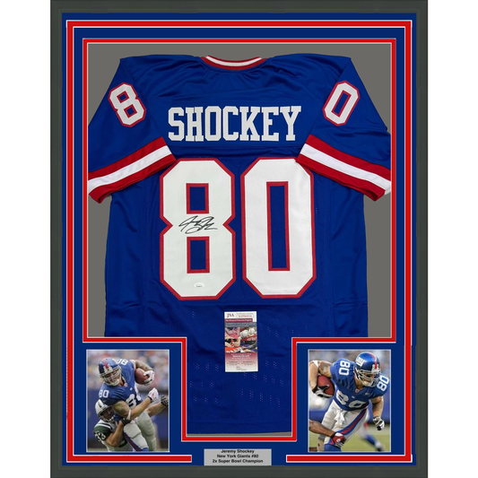 Framed Autographed/Signed Jeremy Shockey 35x39 New York Blue Retro Football Jersey JSA COA #2