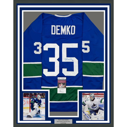 Framed Autographed/Signed Thatcher Demko 35x39 Vancouver Blue Hockey Jersey JSA COA