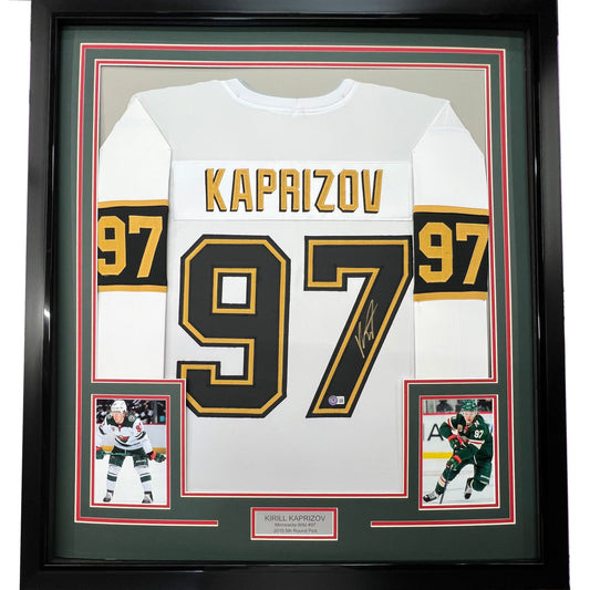 Framed Autographed/Signed Kirill Kaprizov 35x39 Minnesota White/Gold Hockey Jersey Beckett BAS COA