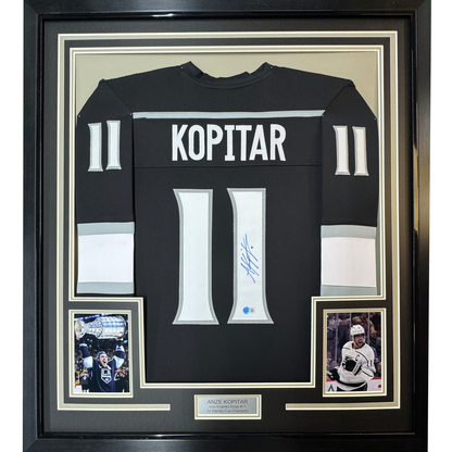 Framed Autographed/Signed Anze Kopitar 35x39 Los Angeles LA Black Hockey Jersey JSA COA