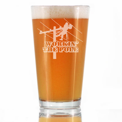 Workin' the Pole Engraved Pint Glass for Beer, Funny Lineworker Themed Gifts for Men and Women in the Electrical Line Workforce  - 16 oz