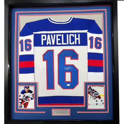 Framed Autographed/Signed Mark Pavelich 35x39 White Team USA Miracle On Ice 1980 Olympics Hockey Jersey JSA COA